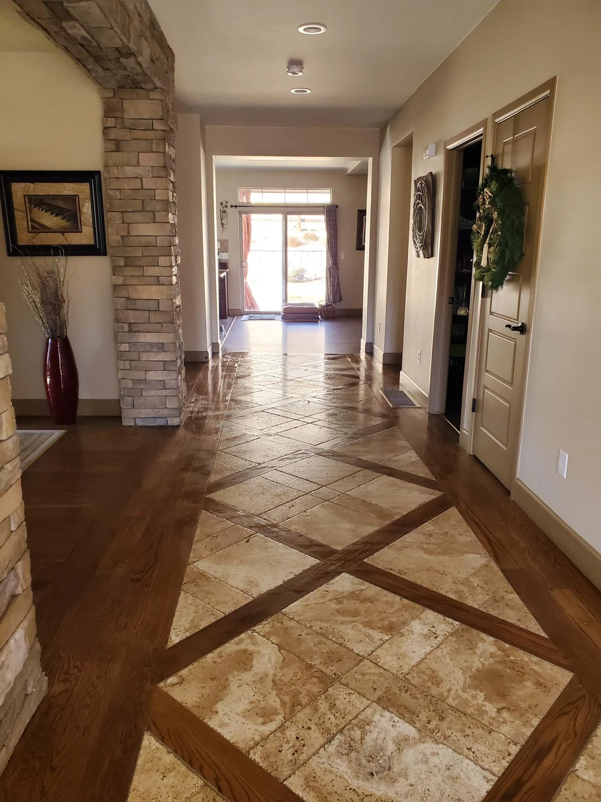 Clean entryway with tile and hardwood floor after a CleanVista cleaning in Denver